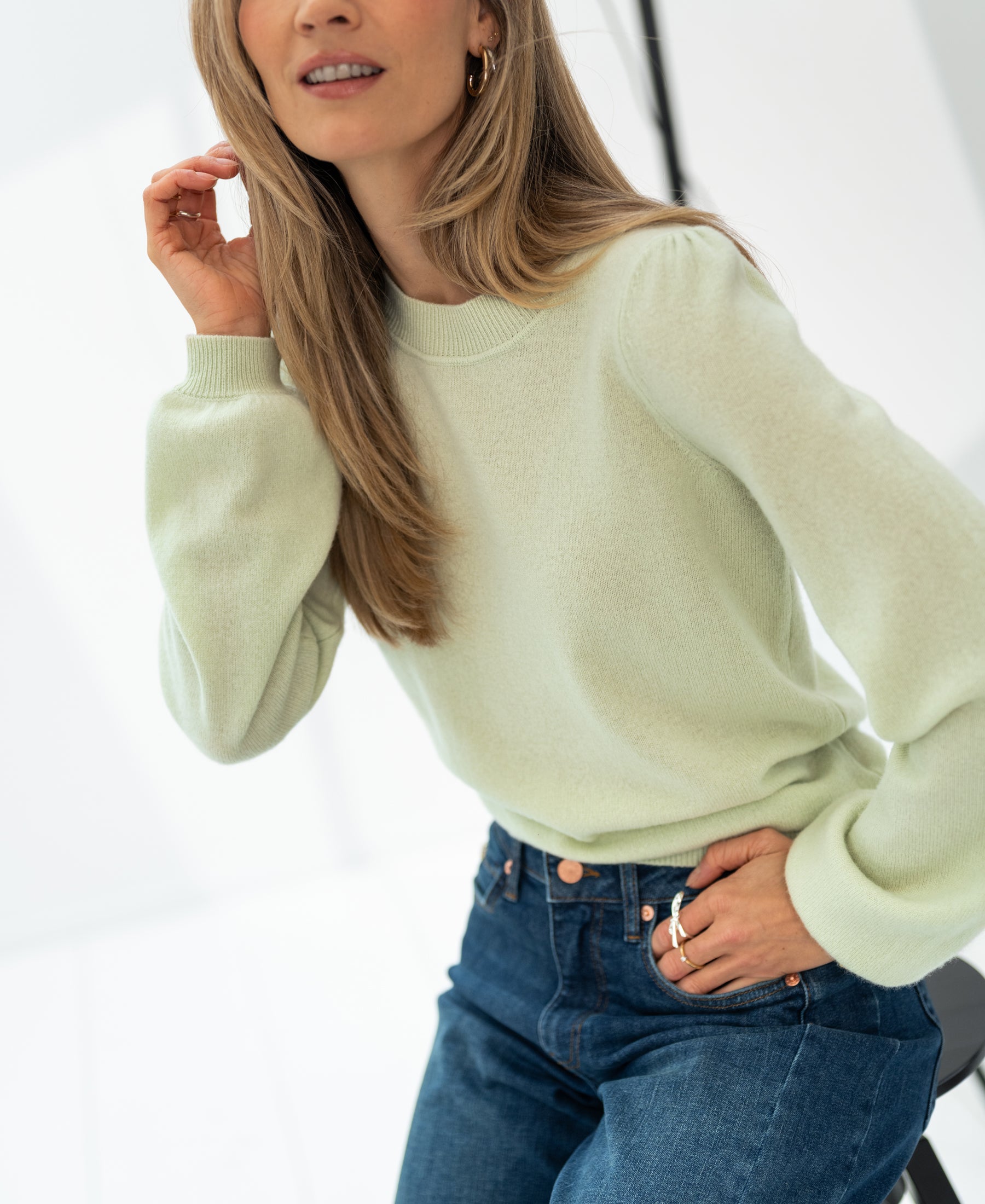Soft merino wool sweater in light green.