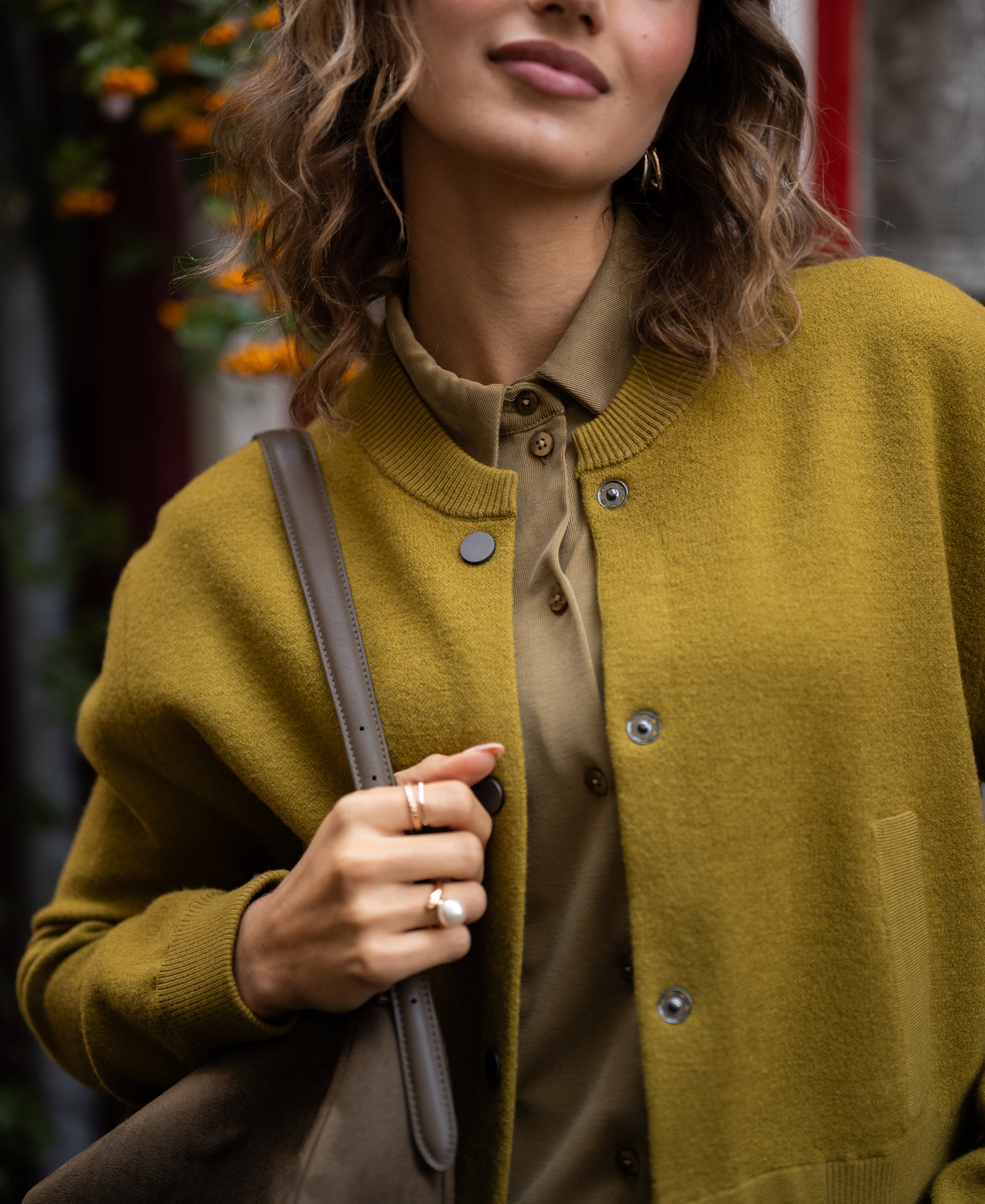 Olive green bomber jacket by PLEIN PUBLIQUE, LA BOMBA style, shown on model.