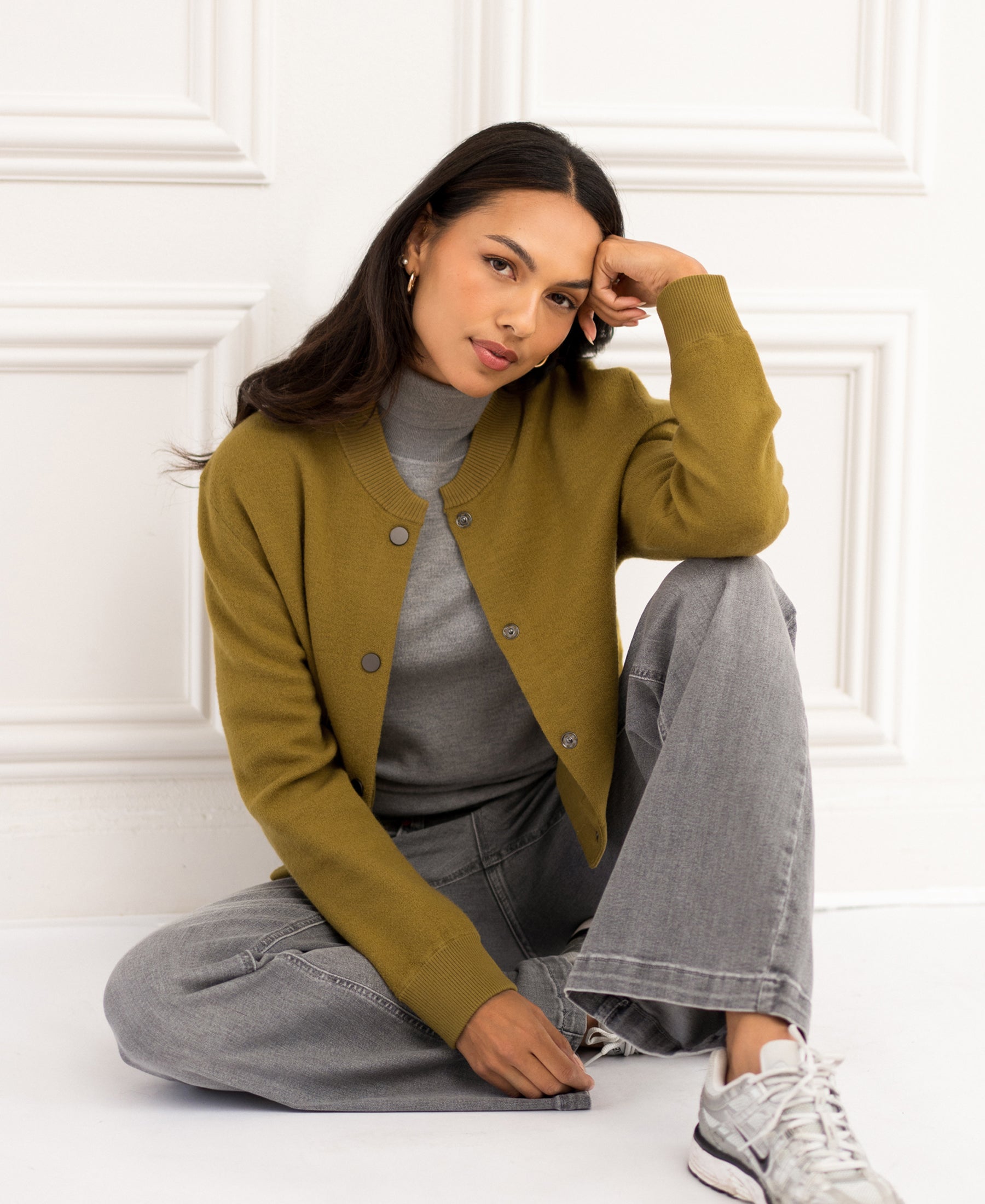 Olive green bomber jacket from Plein Publique shown on a model.