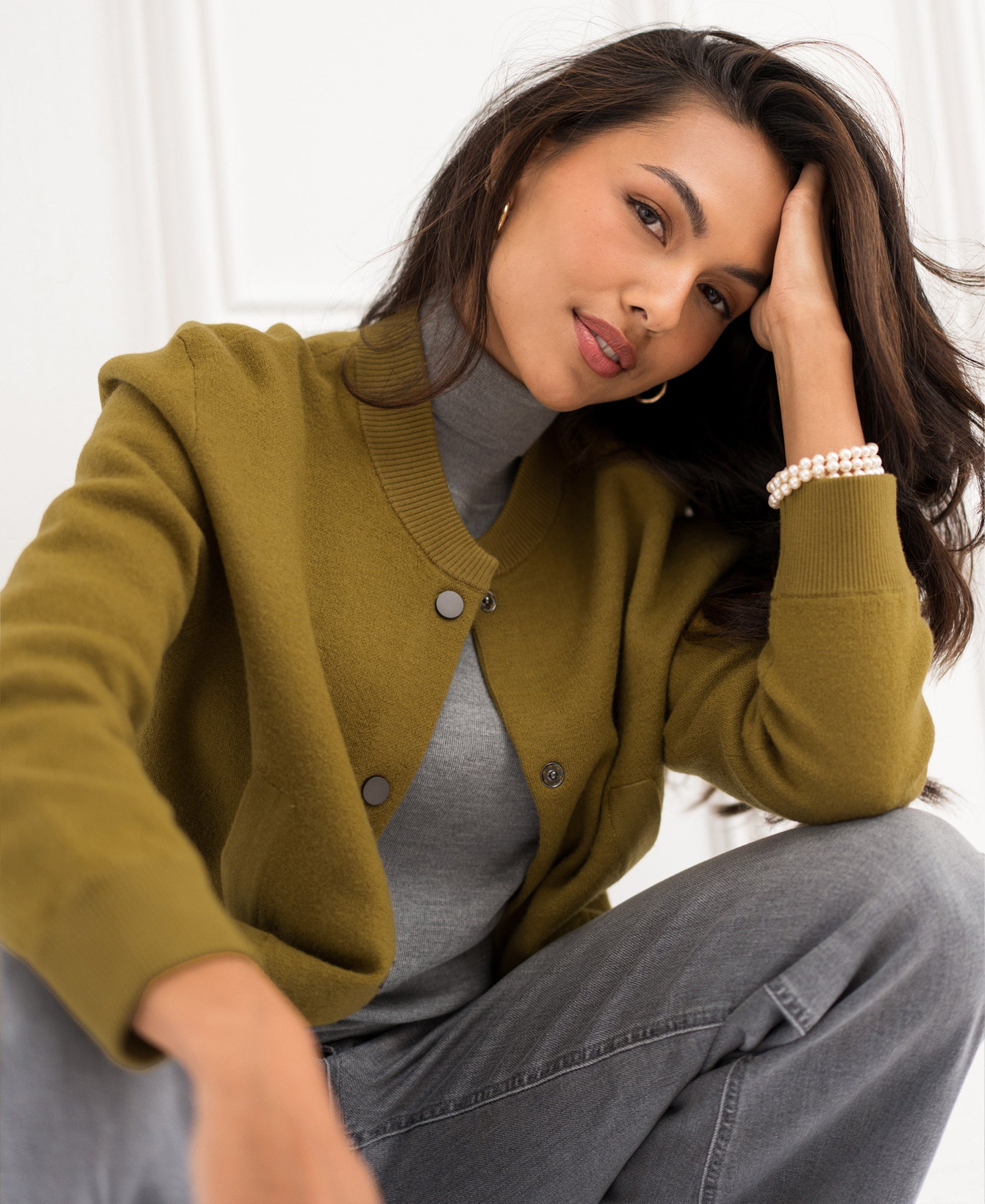 Olive green bomber jacket cardigan in a casual style, shown from the front.