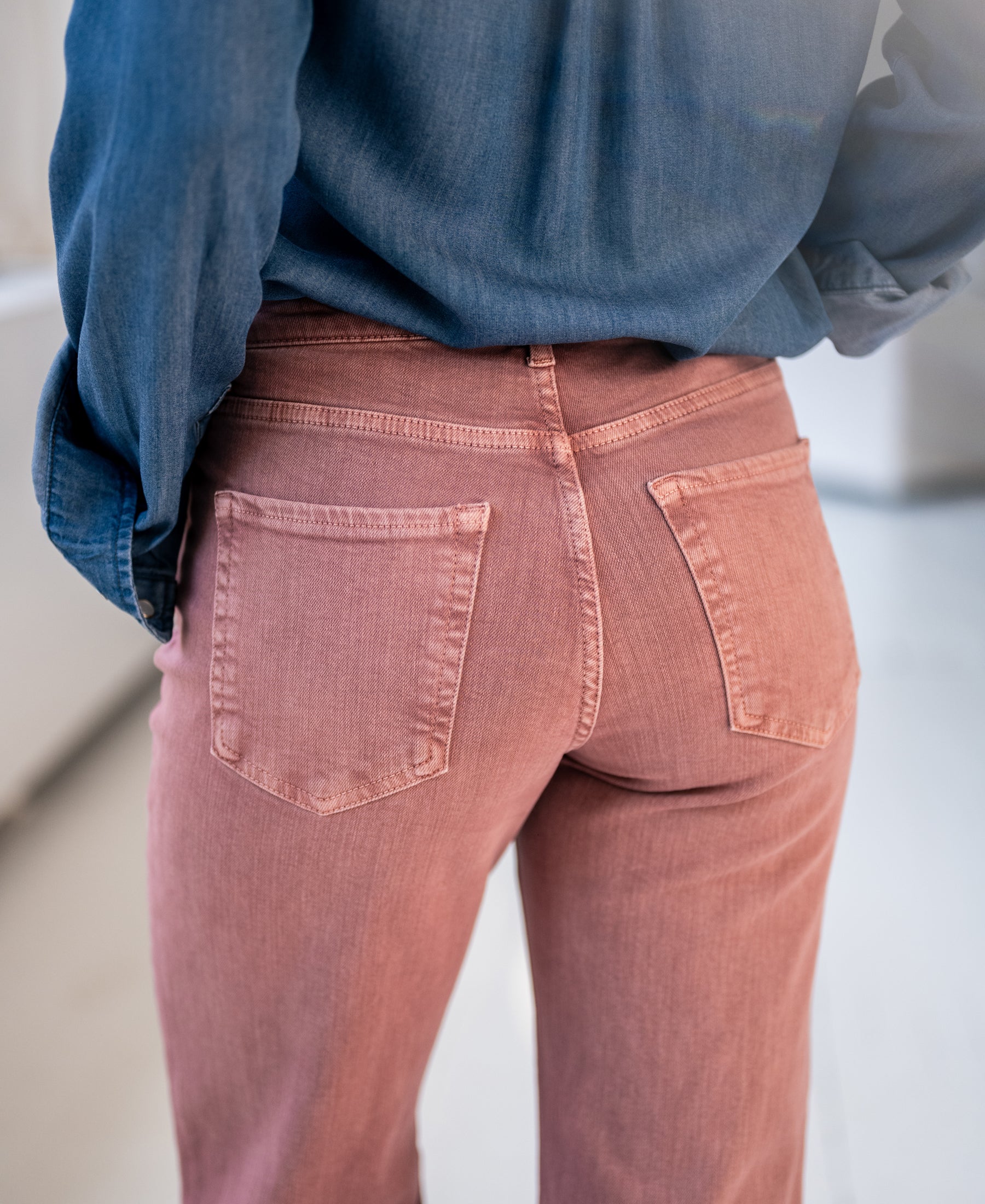 Dusty pink LES DEUX jeans by Plein Publique, shown from the back with focus on pockets and fabric texture.