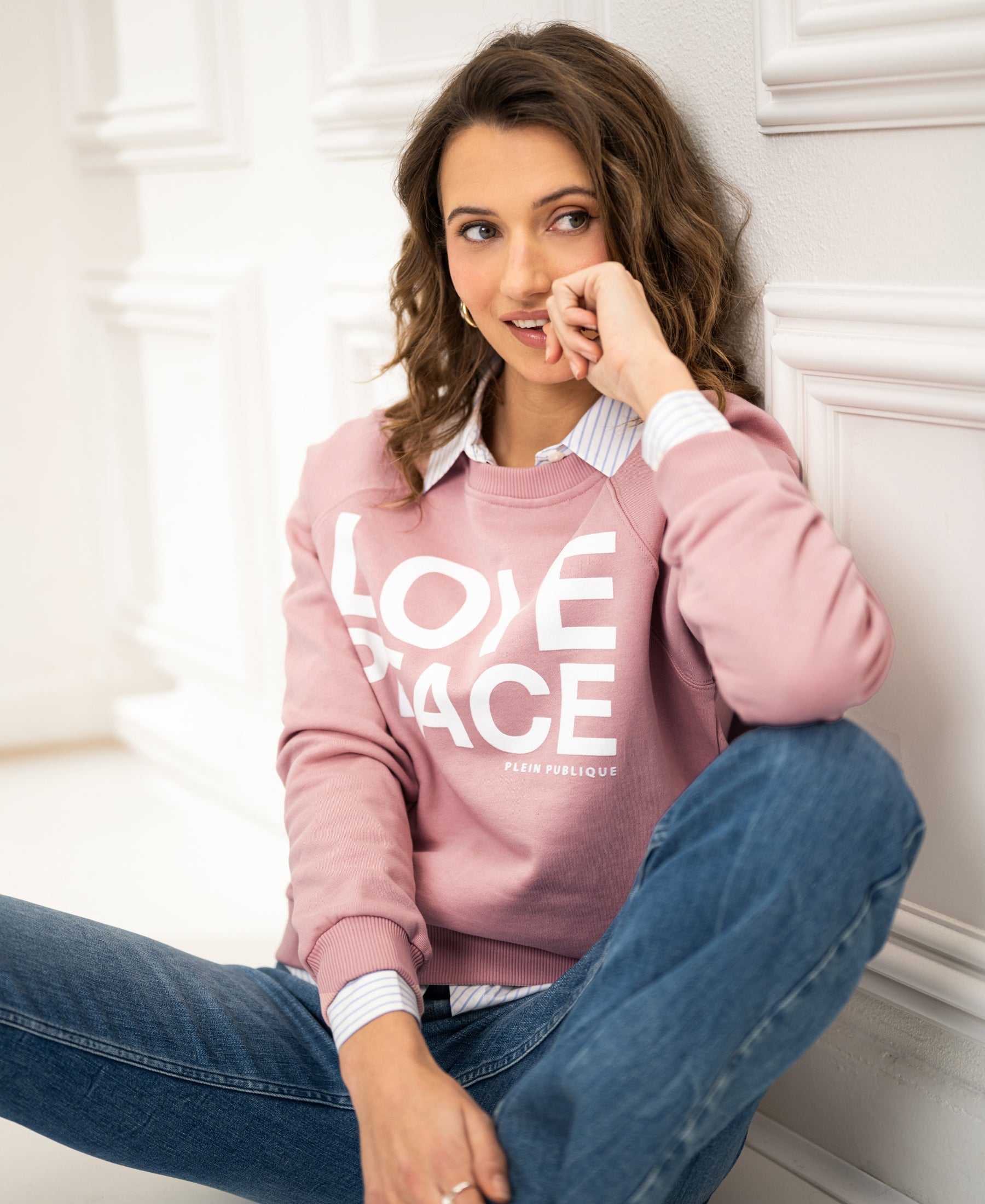 Antique rose LOVE PEACE sweater in a soft knit, featuring the text “LOVE PEACE” on the front.
