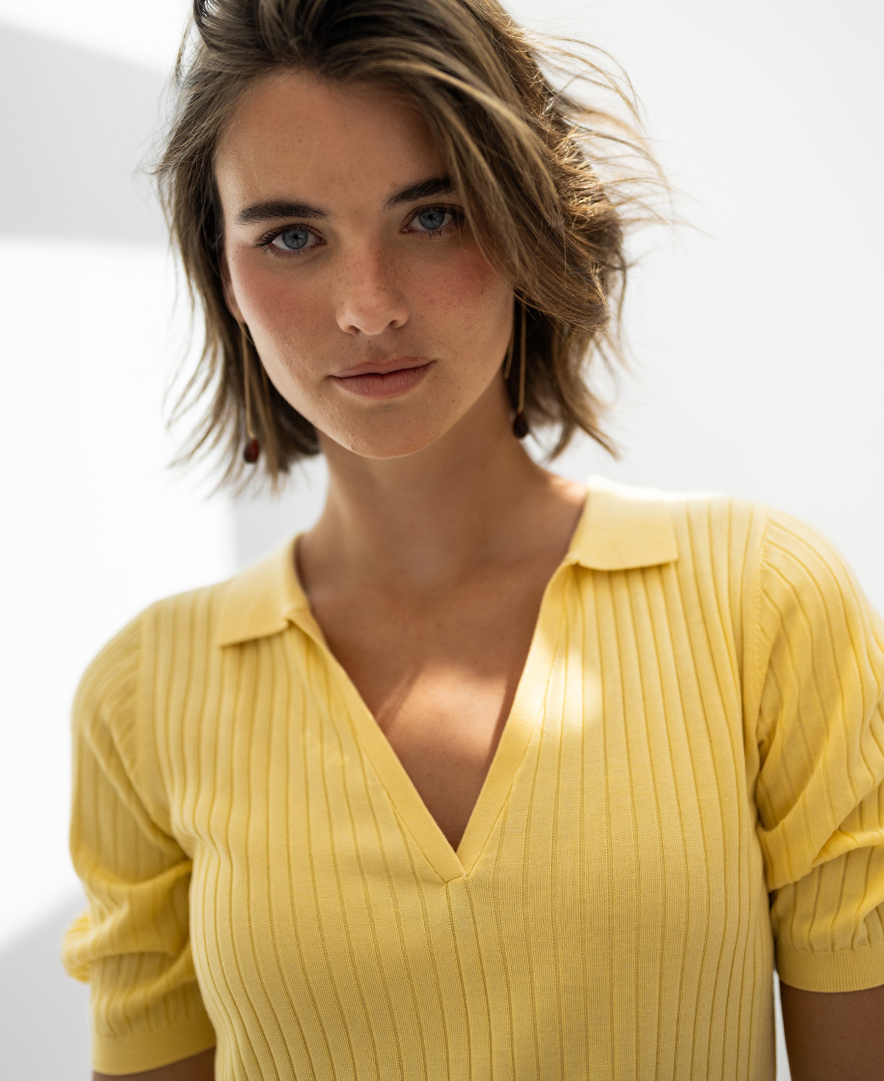 Yellow Tencel-silk LE JASMIN polo shirt by PLEIN PUBLIQUE shown against a light background.
