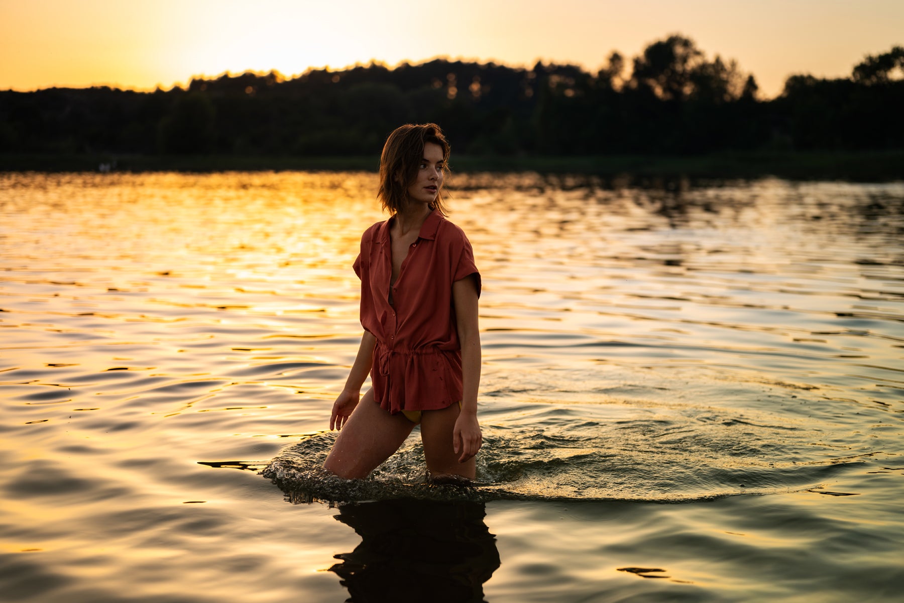 LA JODY Terra blouse by PLEIN PUBLIQUE shown in golden sunset light.