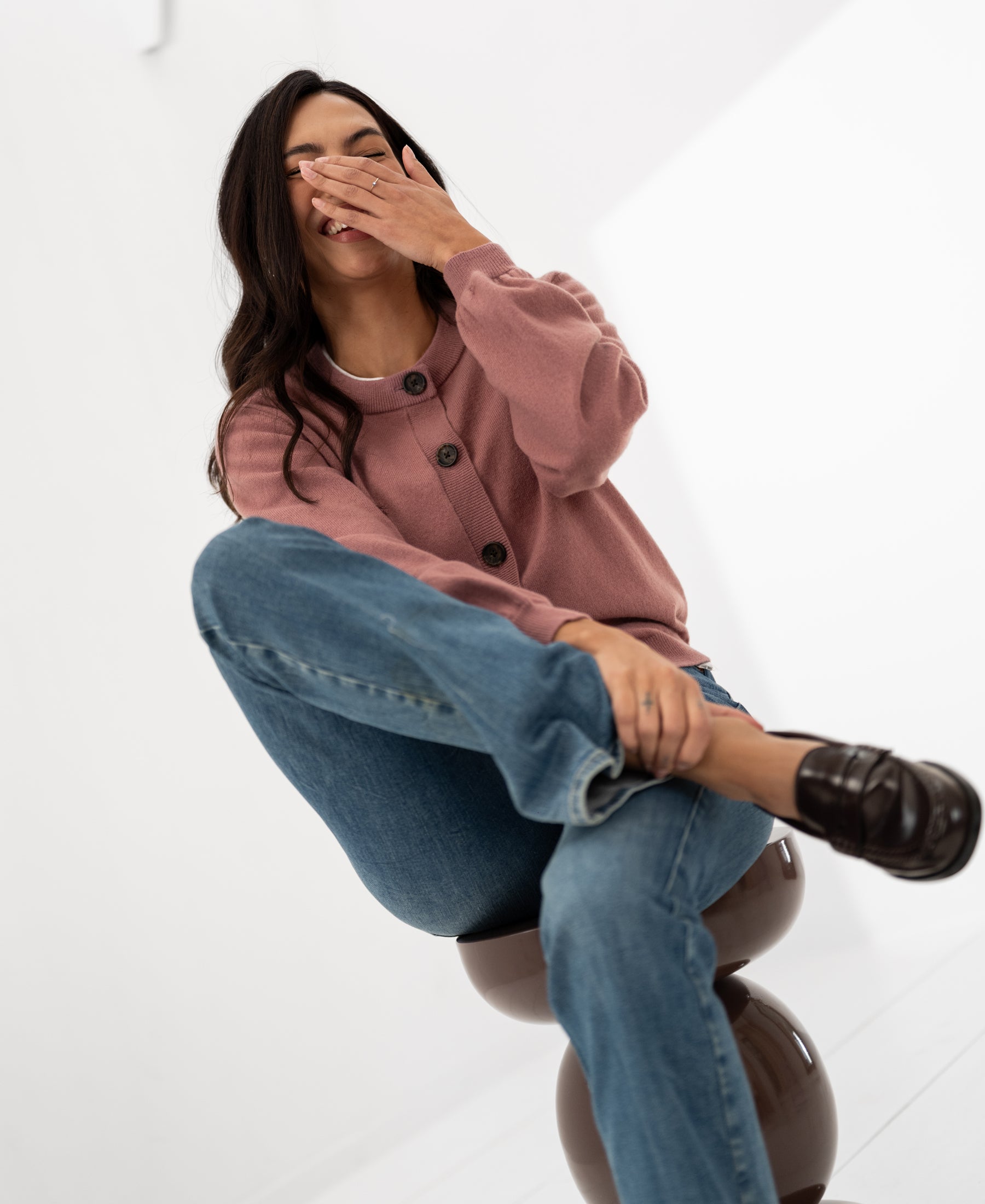 Dusty pink round-neck vest shown on a model.