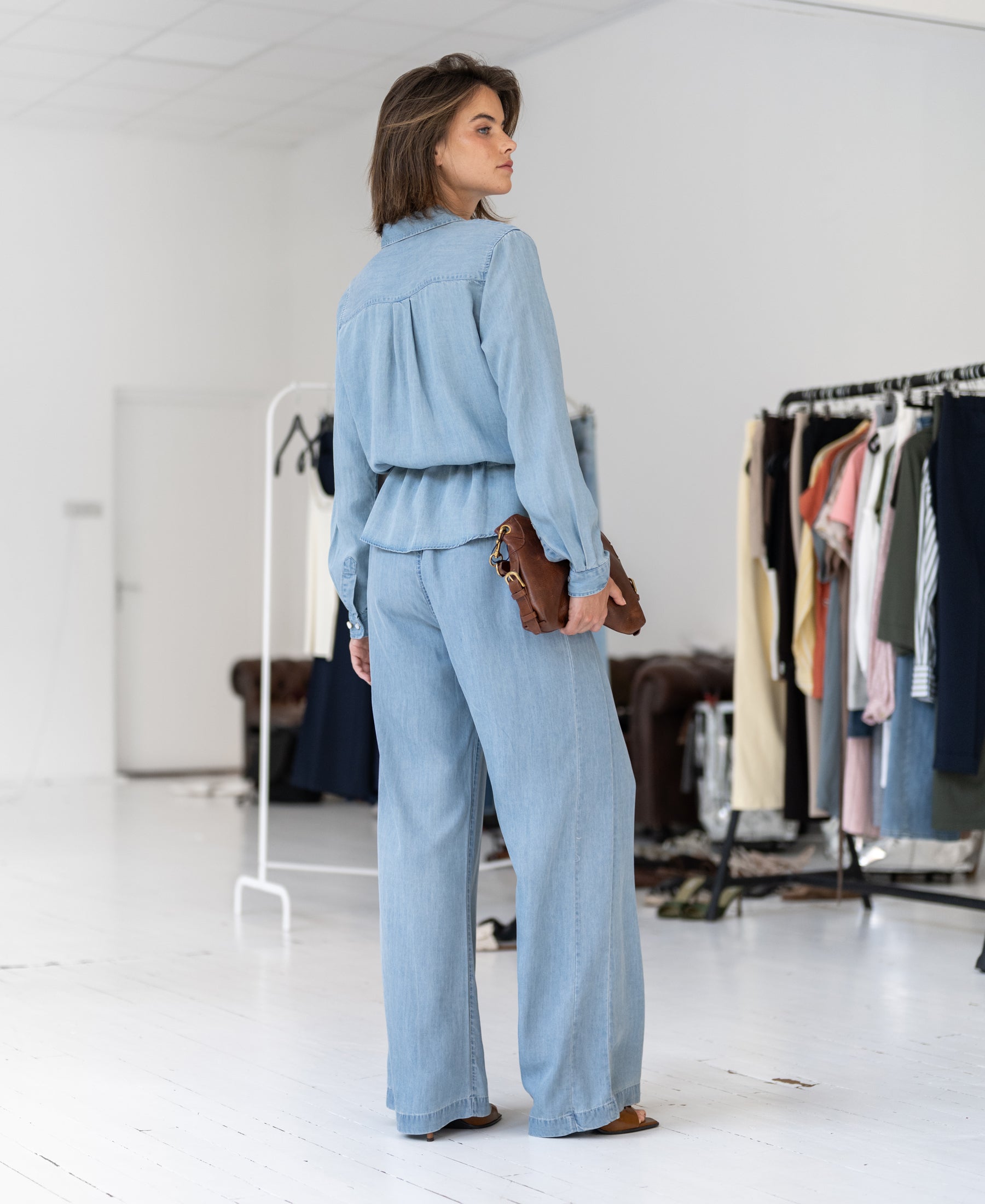 Bleached Tencel denim jeans in a straight-leg style, shown worn by a model.