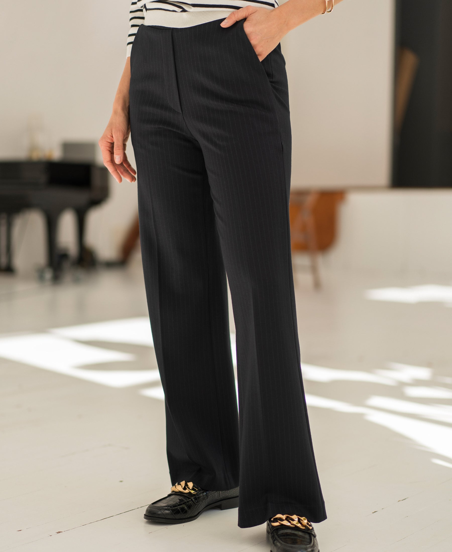 Black pinstripe trousers (LE MALO) by Plein Publique.