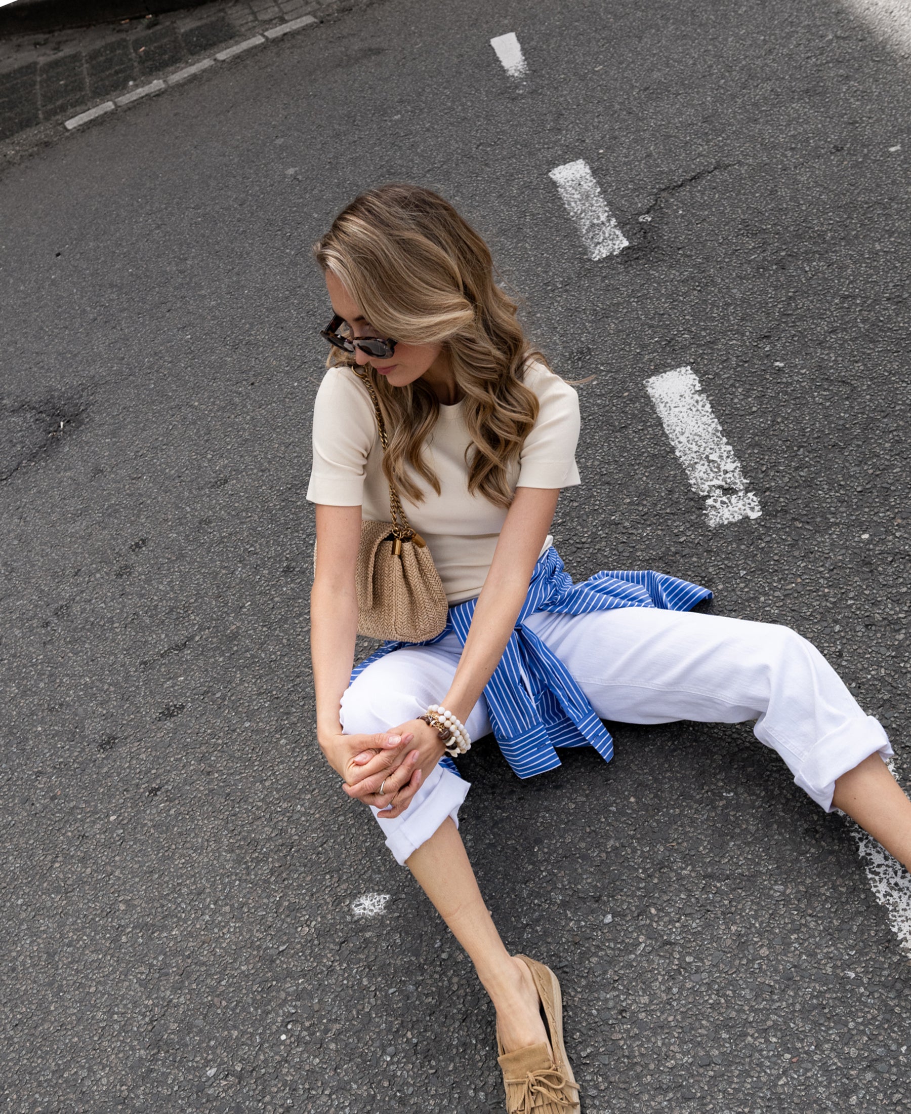 Woman wearing a soft, luxe yellow LA MASSY Butter T-shirt by PLEIN PUBLIQUE.