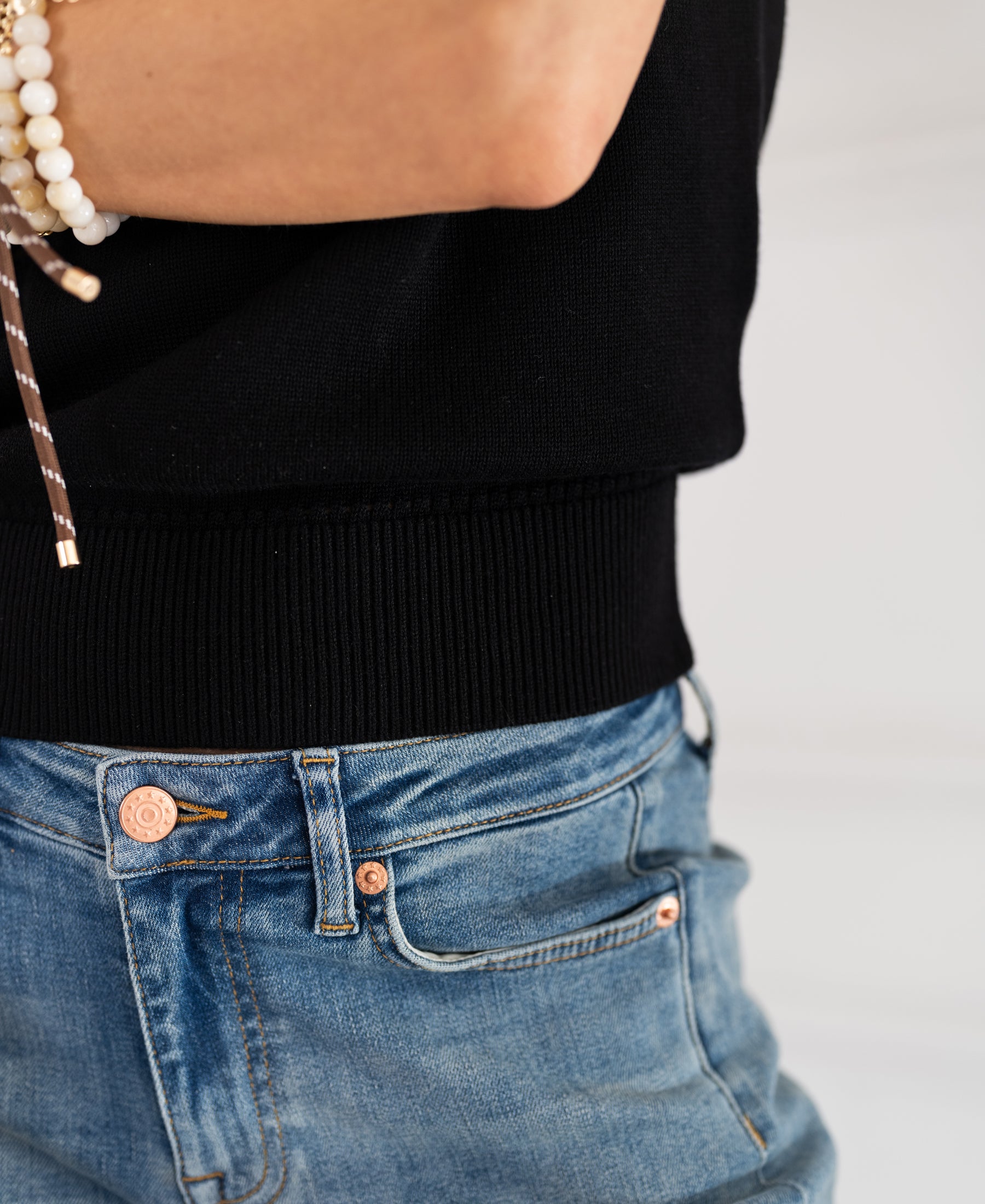 Closeup of the Spencer LE REVEIL Black sweater by PLEIN PUBLIQUE.