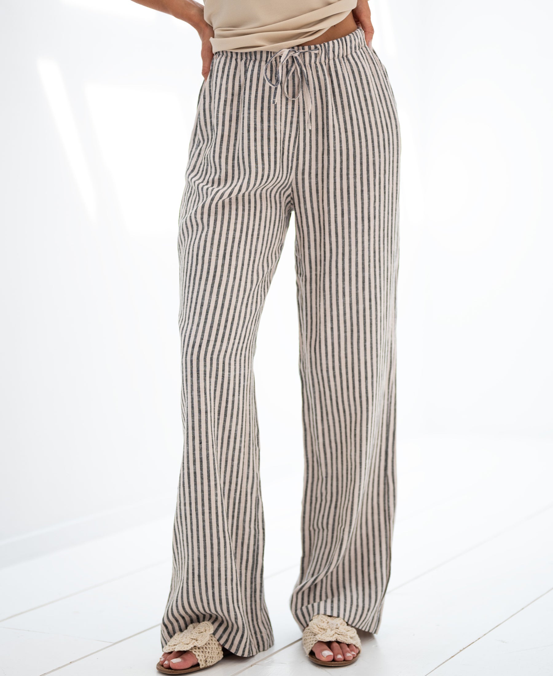 Striped linen-blend trousers LA SECONDE by PLEIN PUBLIQUE.