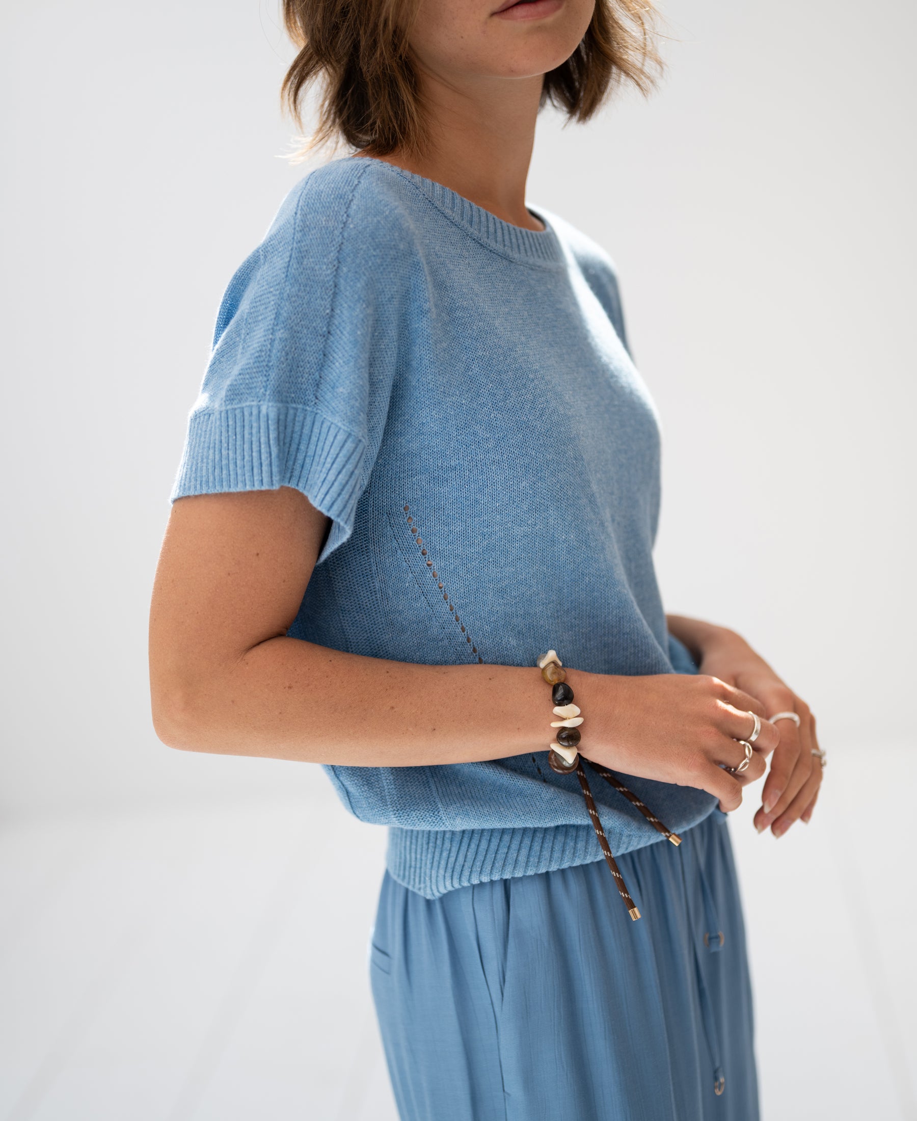 Light blue linen Le Soleil summer sweater top.