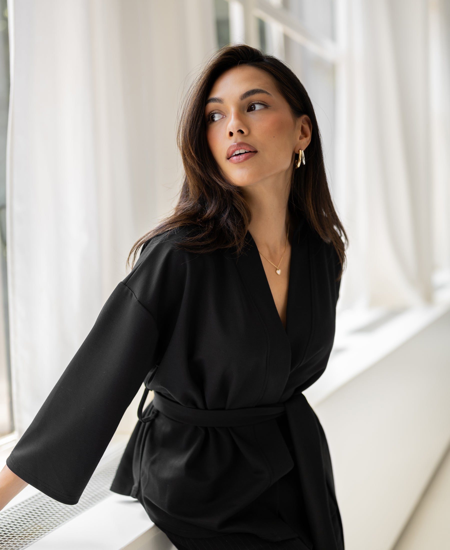 Black LA TOKYO Kimono Wrap Cardigan from PLEIN PUBLIQUE.