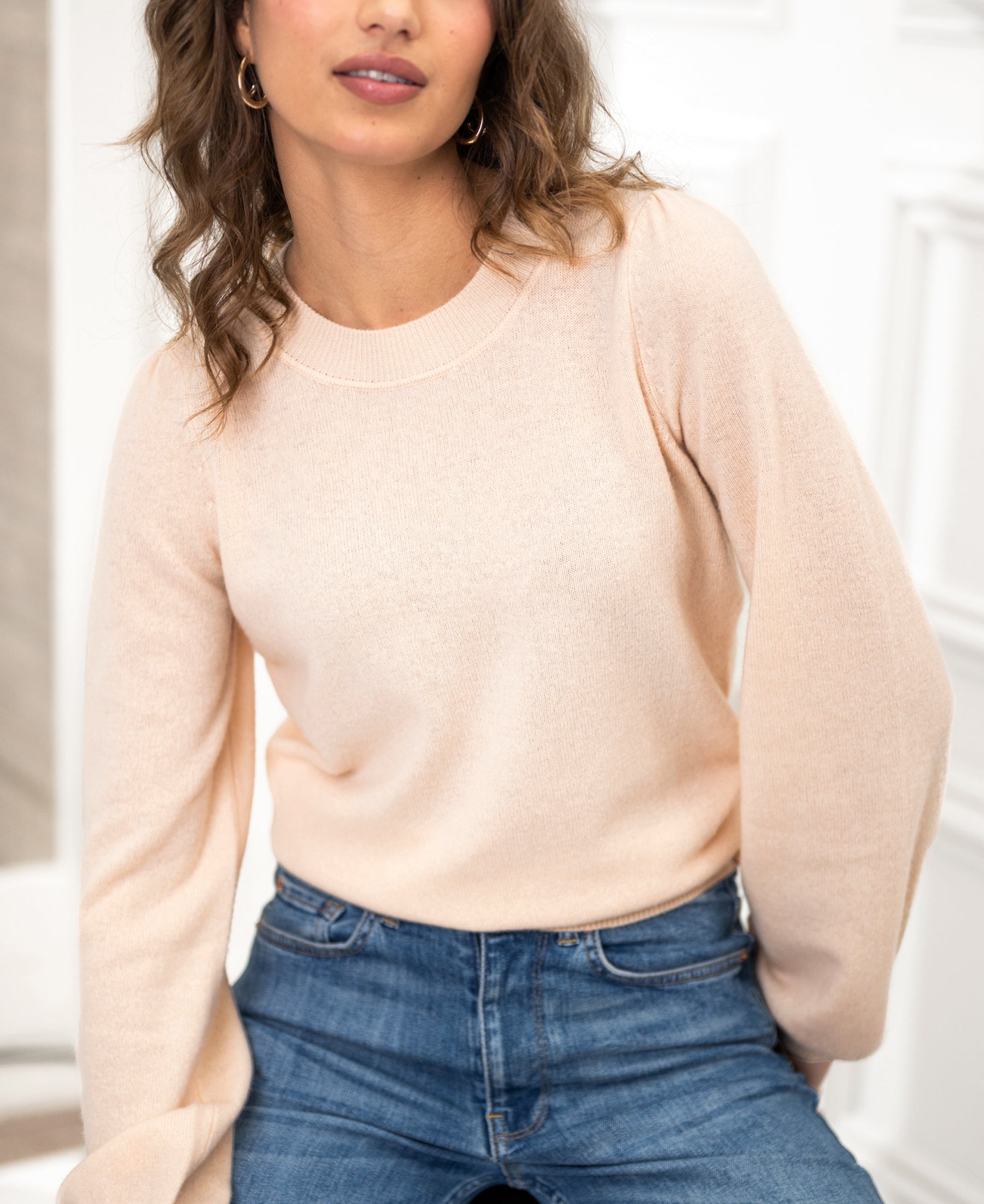 PLEIN PUBLIQUE LA BAYONNE merino wool sweater in butter color with puff sleeves, shown indoors.