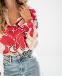 Ruby Red print blouse by LA BINOCLE, shown against a plain light background.