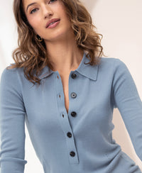 Blue merino wool polo shirt by Plein Publique, front view.