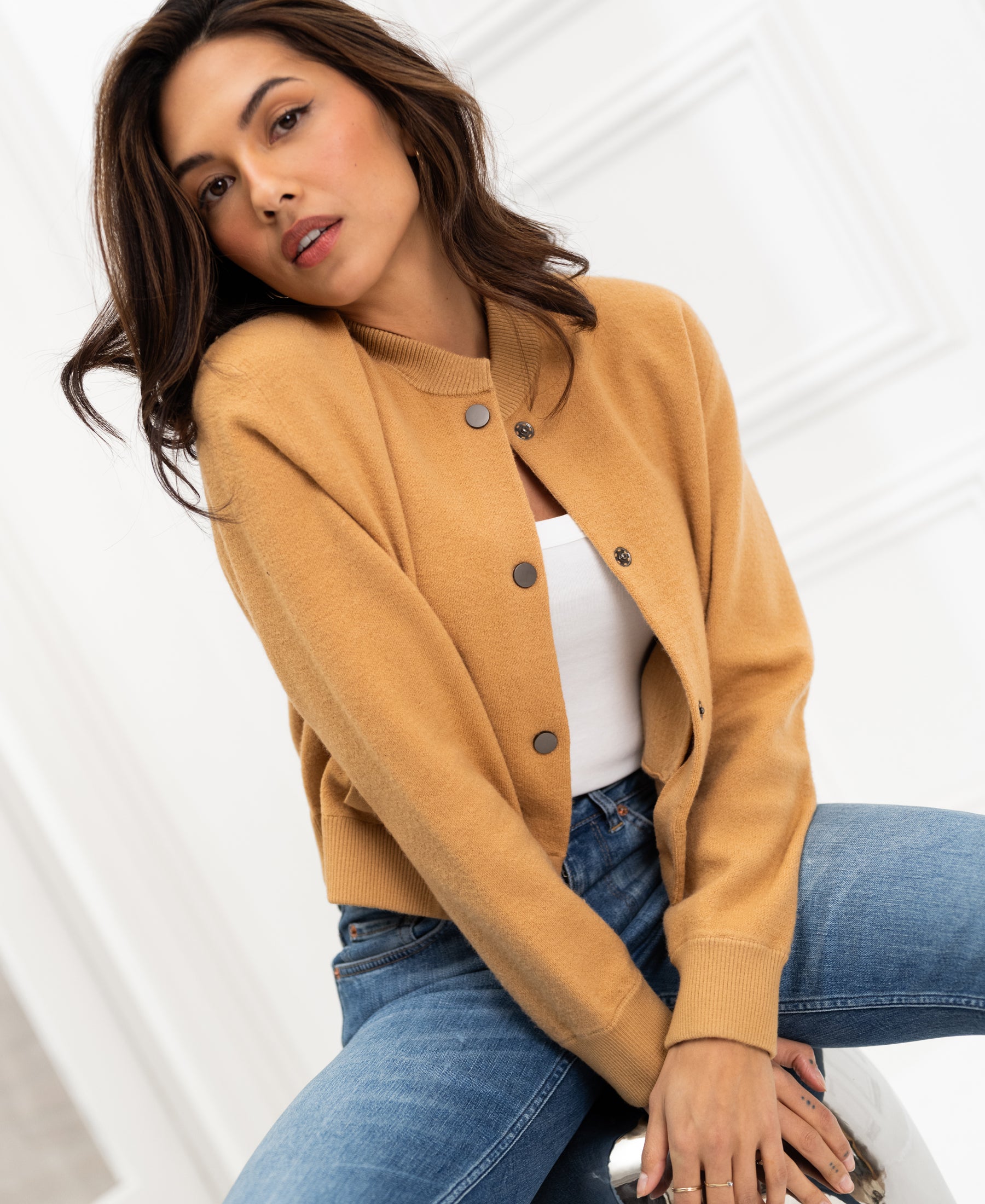 Light camel bomber jacket by Plein Publique, LA BOMBA style, shown indoors with a clear front view.