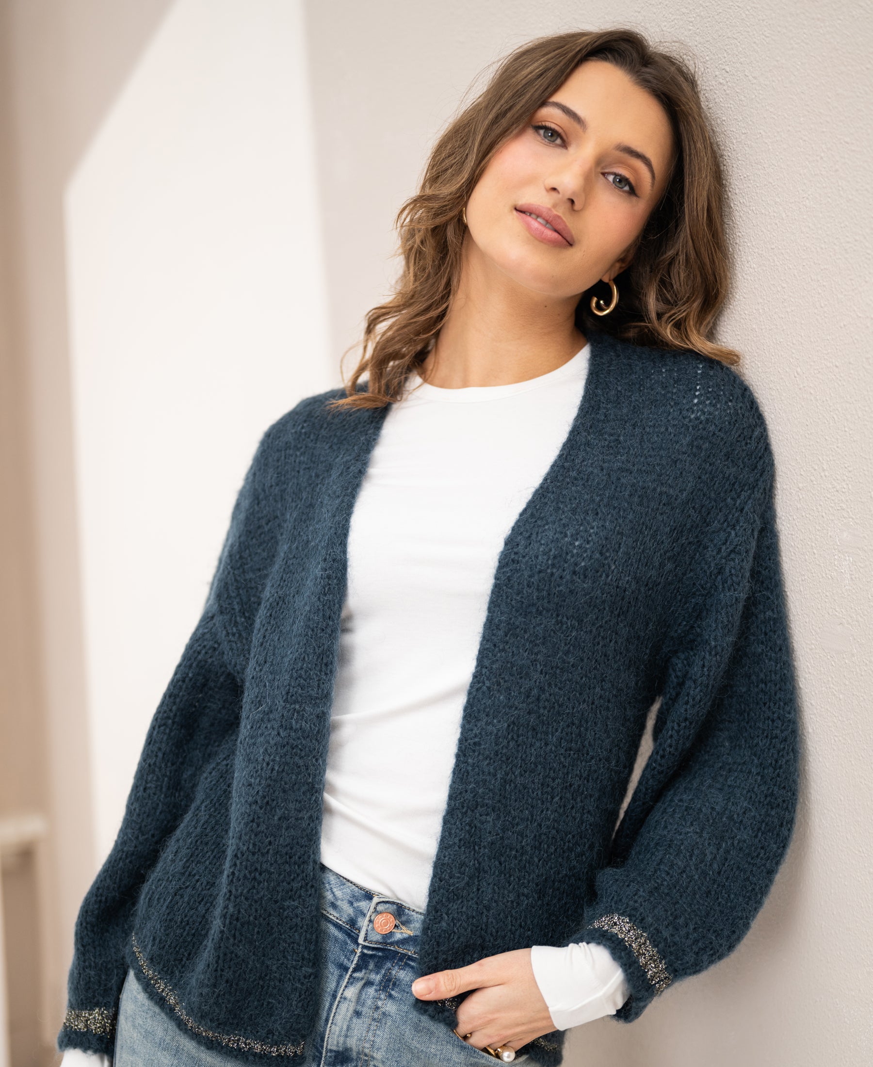 Woman wearing a PLEIN PUBLIQUE Fluffy vest LA CHERIE Dark Moss Green.