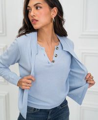 Light blue PLEIN PUBLIQUE LA DOUBLE cardigan sweater, shown indoors with front open.