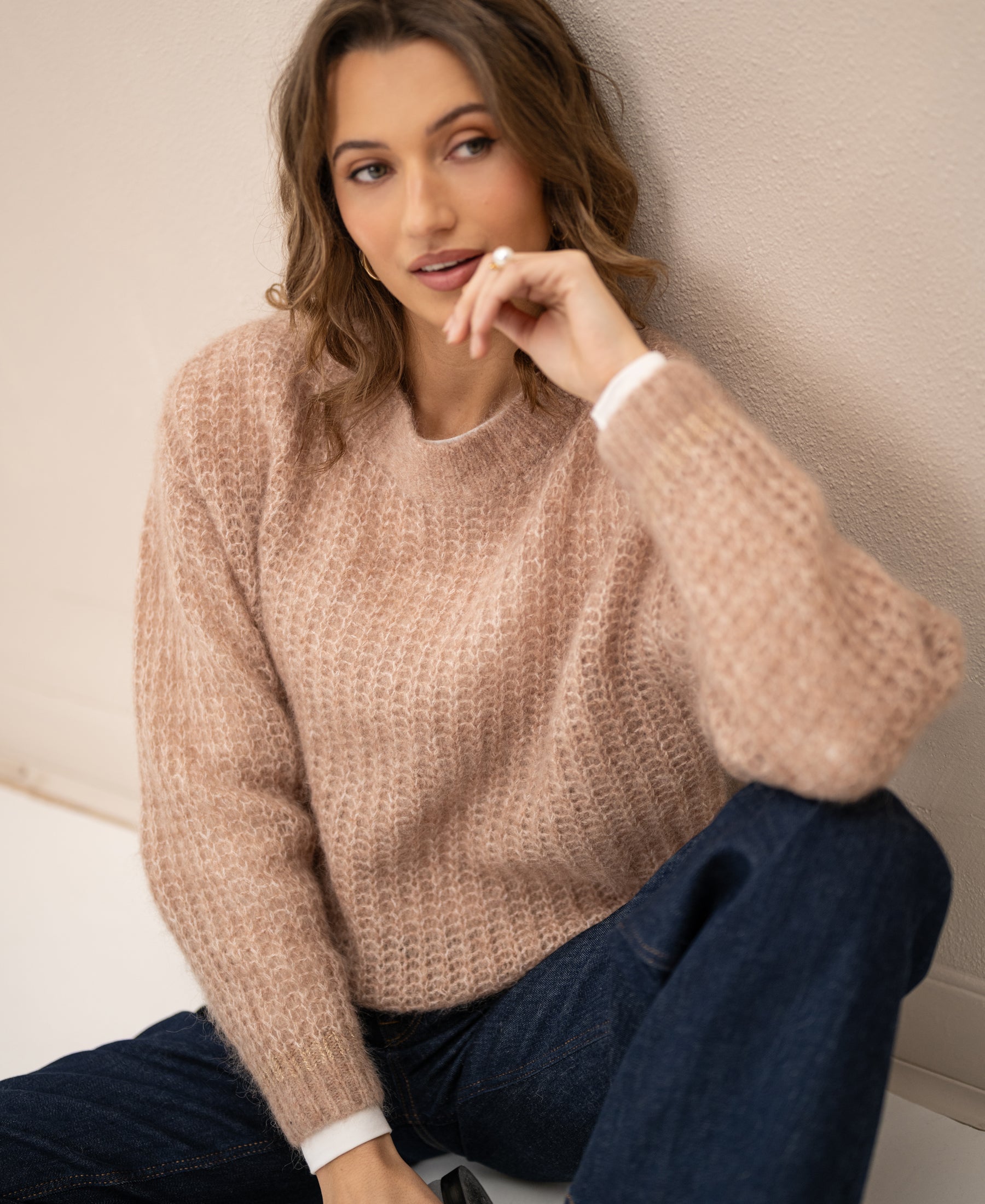 Oversized PLEIN PUBLIQUE mohair sweater in fudge brown, shown on model with wavy hair.