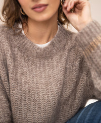 Semi-oversized sand-colored mohair sweater in a La Douce style.