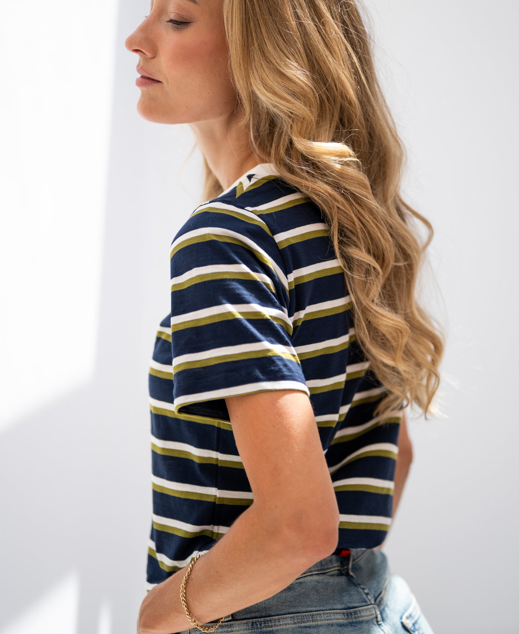 Striped LA DYLAN T-shirt in dark blue and olive green by PLEIN PUBLIQUE, shown in natural light.