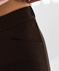 Close-up of brown cropped pants with pocket, by PLEIN PUBLIQUE, style The Faubourg, Pure Choco color.