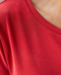 Close-up of a red PLEIN PUBLIQUE two-way T-shirt with a V-neckline.