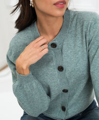 Woman wearing mint green LA LEA round neck vest by PLEIN PUBLIQUE.