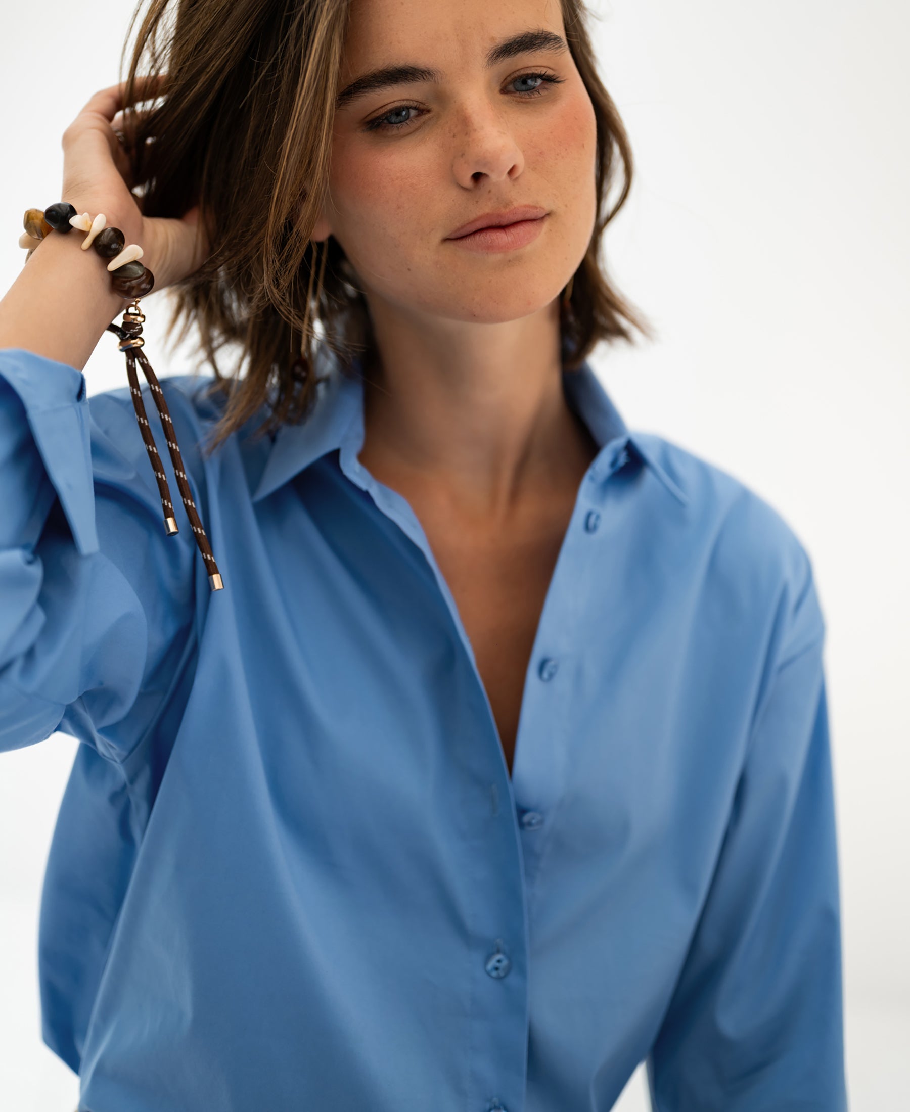 Oversized easy-iron blue blouse LE LILLE shown against a white background.