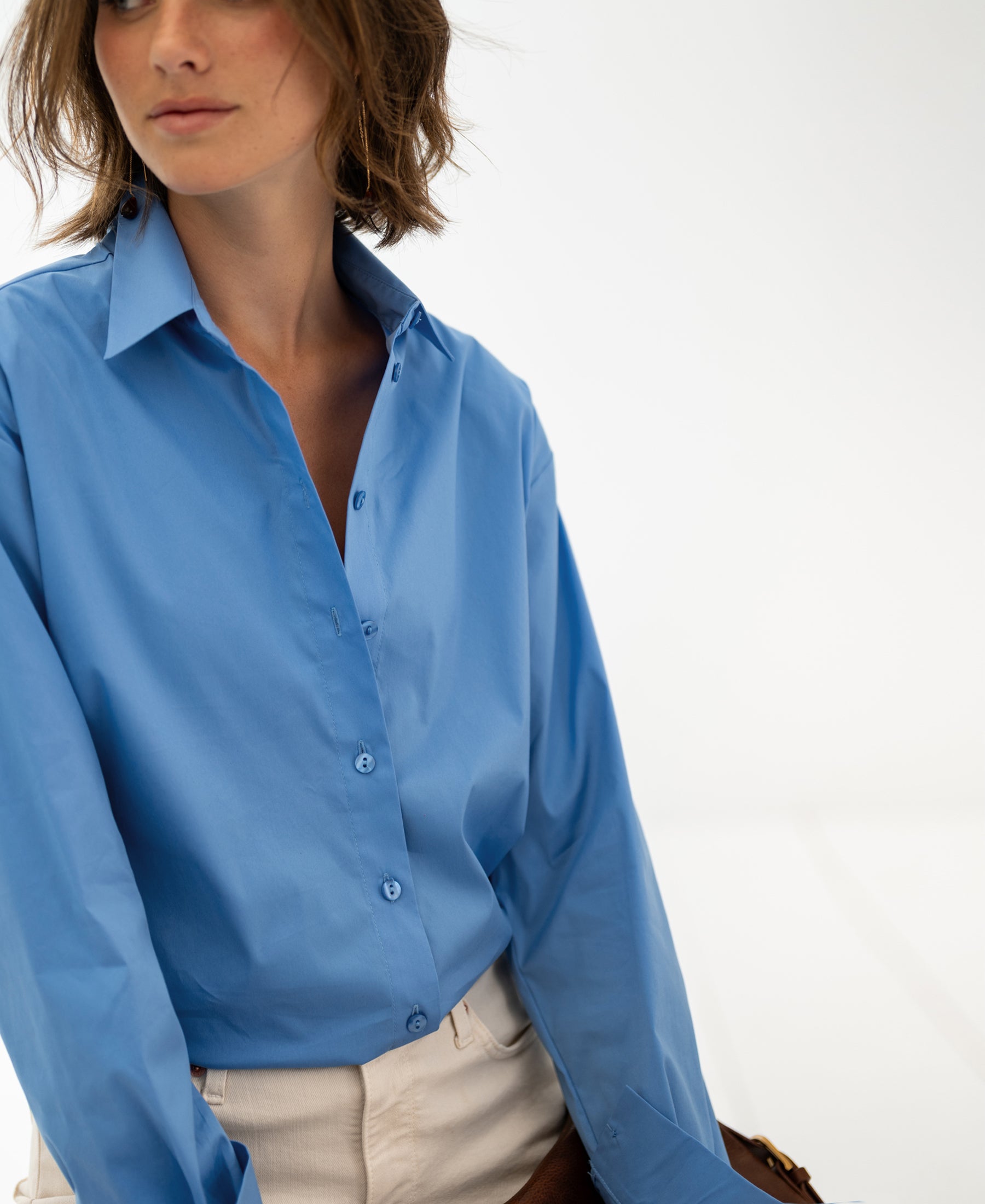 Oversized easy-iron blue blouse LE LILLE shown against a plain white background.