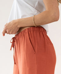 Terra rust-colored LA LYNETTE pants from PLEIN PUBLIQUE.