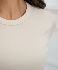 Close-up of the Luxe & soft Butter T-shirt in light yellow by PLEIN PUBLIQUE.