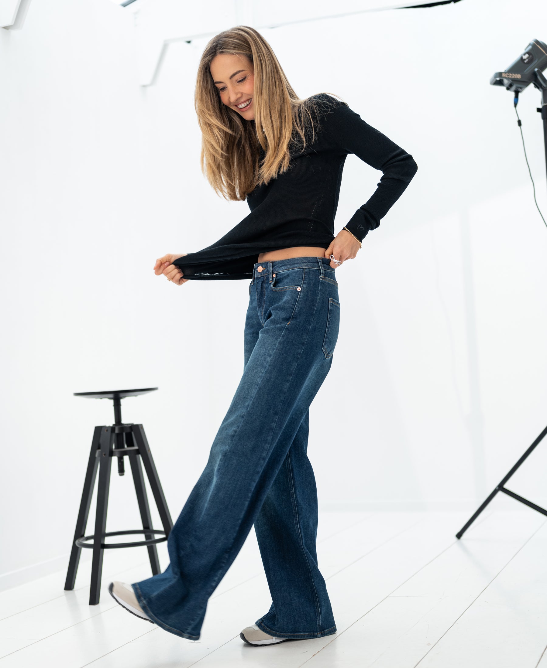 Black Luxe merino shirt from PLEIN PUBLIQUE shown in a bright studio setting.