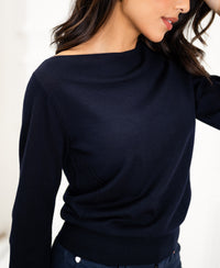 Dark blue PLEIN PUBLIQUE boatneck sweater LA MUSE shown from shoulders to hips.