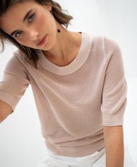 Light sand mesh sweater with silk by PLEIN PUBLIQUE, shown against a blurred background.