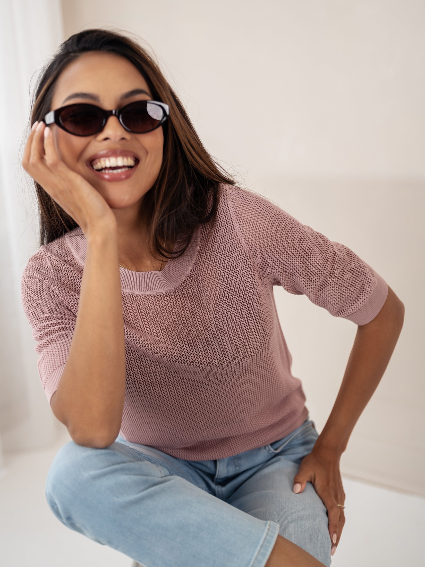 Dusty pink mesh sweater with silk, shown on a model.