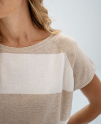Sand-ivory striped sweater, shown neck to mid-torso.