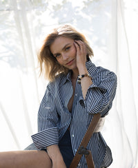 Oversized LA PASCALLE white-anthracite striped blouse, bright background.