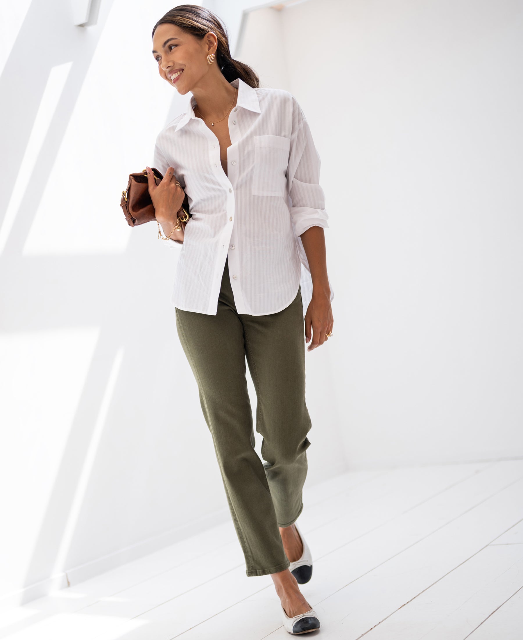 White tonal striped blouse from Plein Publique La Pascalle, shown in sunlight.