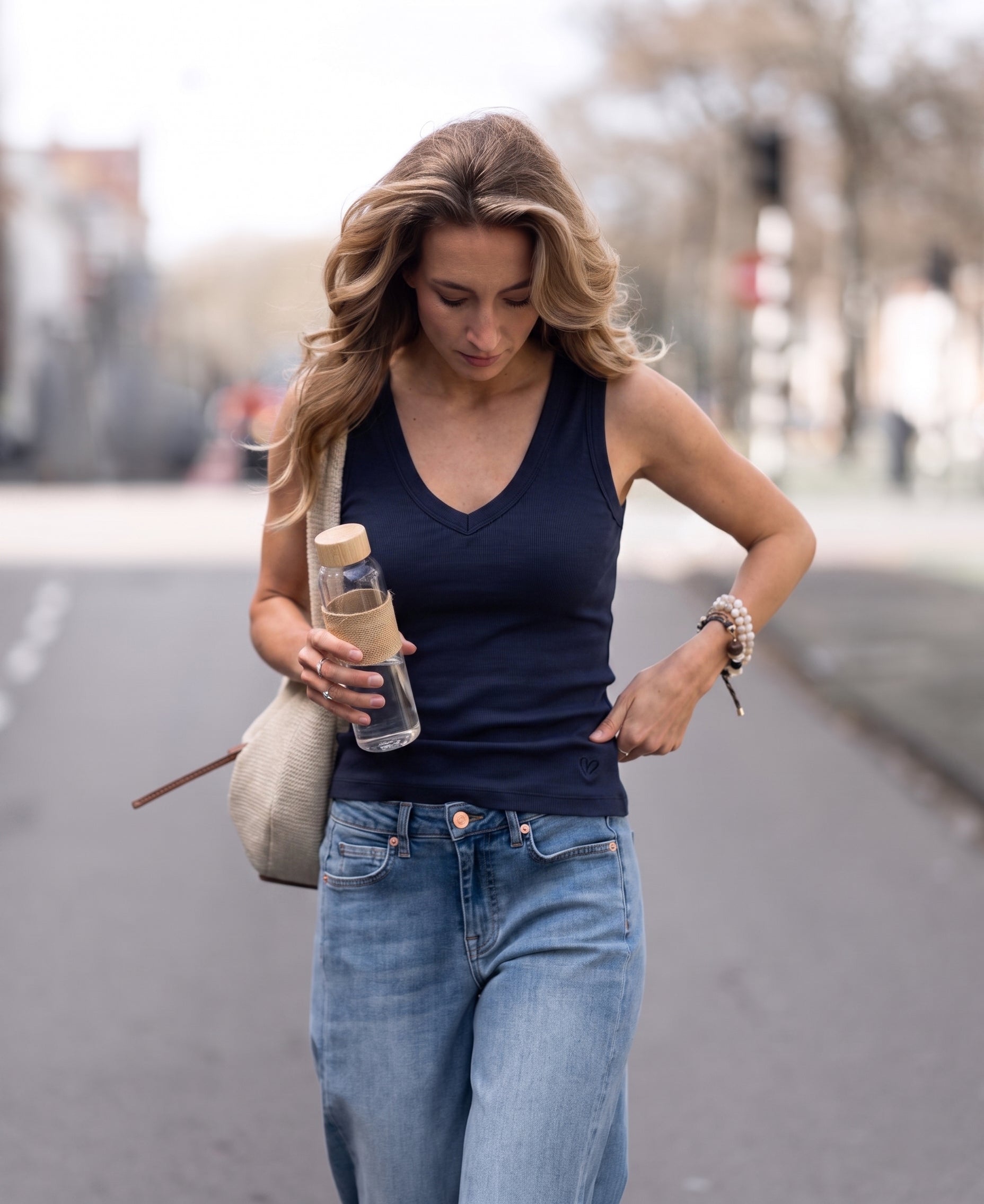 Navy blue PLEIN PUBLIQUE Luxe & soft LA VALE top shown outdoors.
