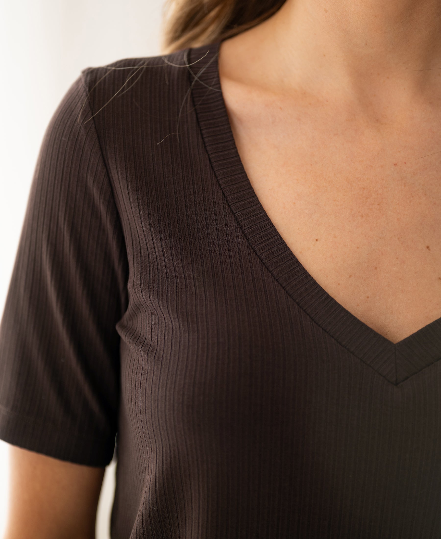 Bamboo T-shirt in chocolate brown, relaxed fit, shown from shoulders to mid-chest.