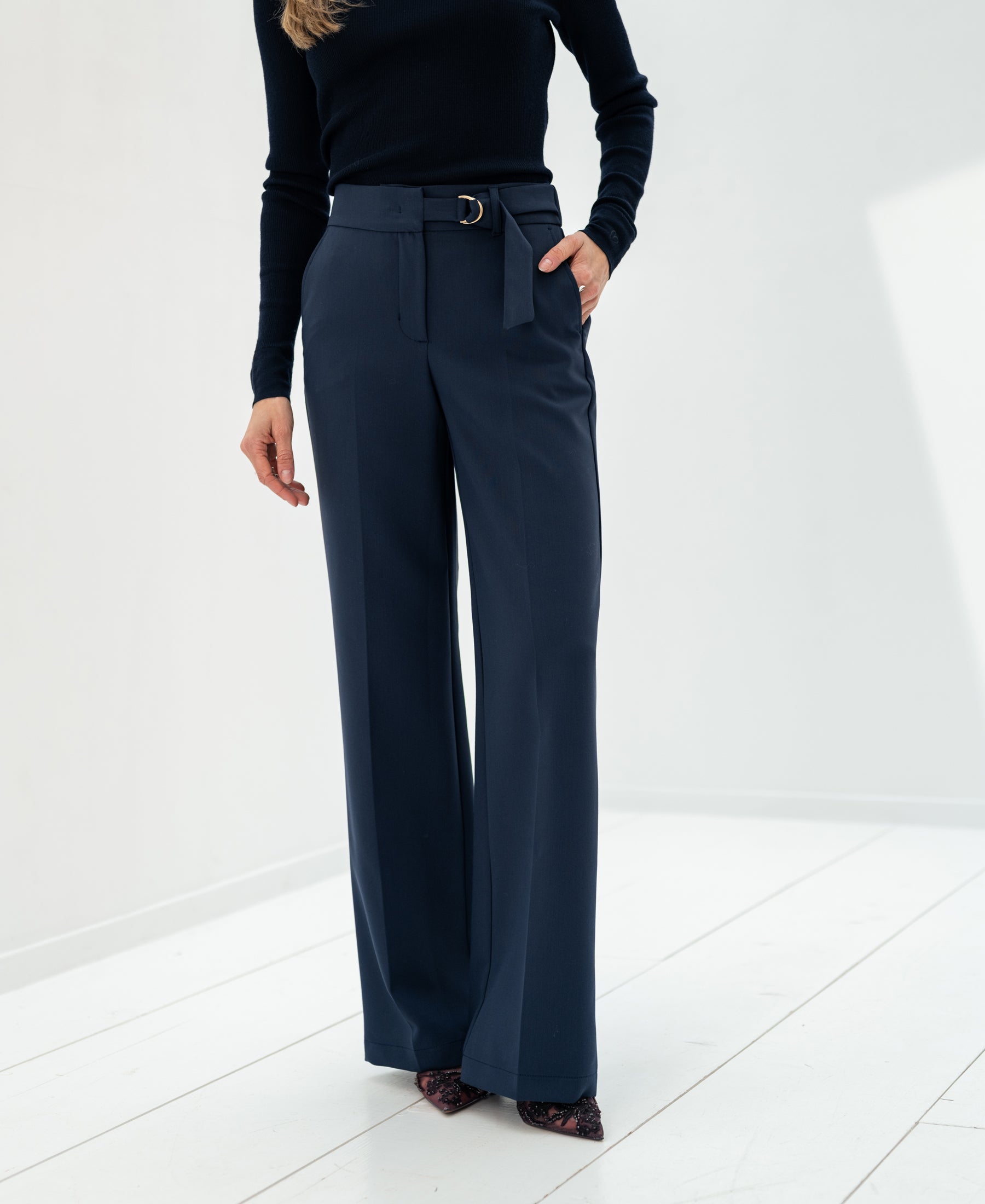 Dark blue LA WENDE trousers by PLEIN PUBLIQUE.